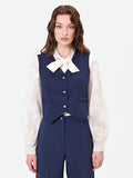 Gilet blu con bottoni gioiello
