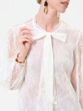 Camicia in pizzo panna bianco con fiocco al collo
