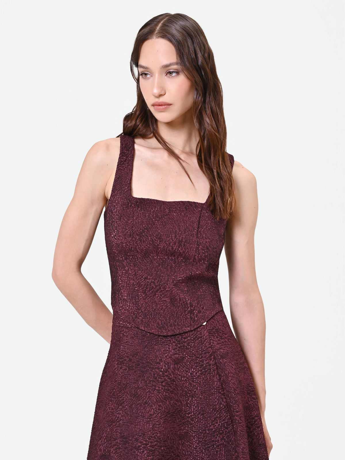 Top bordeaux in tessuto jacquard lamé