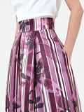 Gonna midi plissettata rosso bordeaux con fantasia floreale