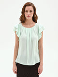 Top verde menta con maniche a volant
