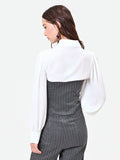 Blusa grigia con bustier gessato e paillettes