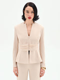 Giacca beige chiaro con drappeggio in vita