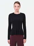 Maglia nera a costine con fondo a peplo in misto viscosa