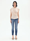 Blusa beige chiaro con drappeggio asimmetrico