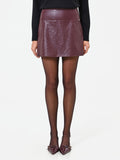 Minigonna bordeaux in similpelle con motivo paisley