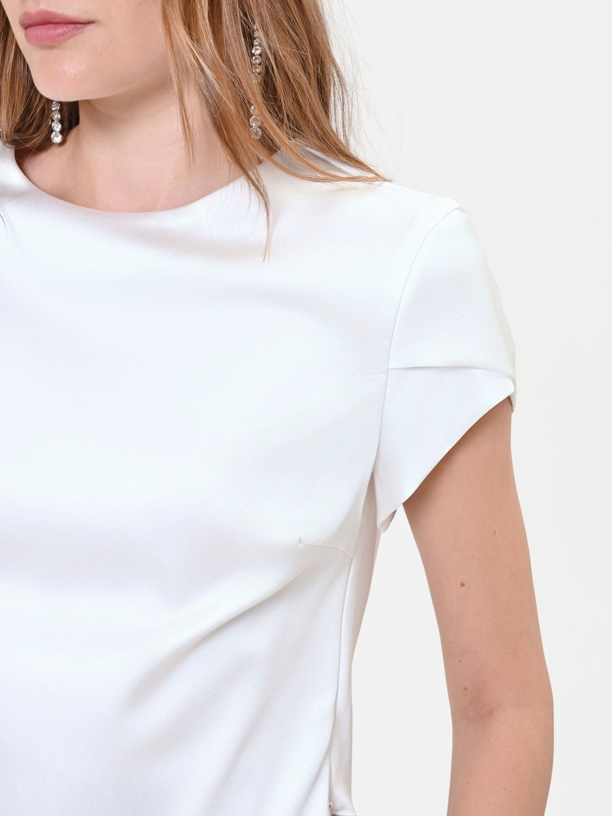 Blusa panna con maniche a risvolto