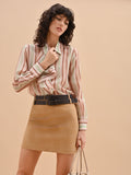 Camicia rosa a righe con rouche