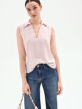 Blusa rosa pastello con collo a rever