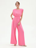Tuta rosa con pantalone a palazzo