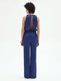 Tuta elegante blu brillante con drappeggio laterale