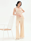 Tuta elegante beige chiaro con corpetto drappeggiato