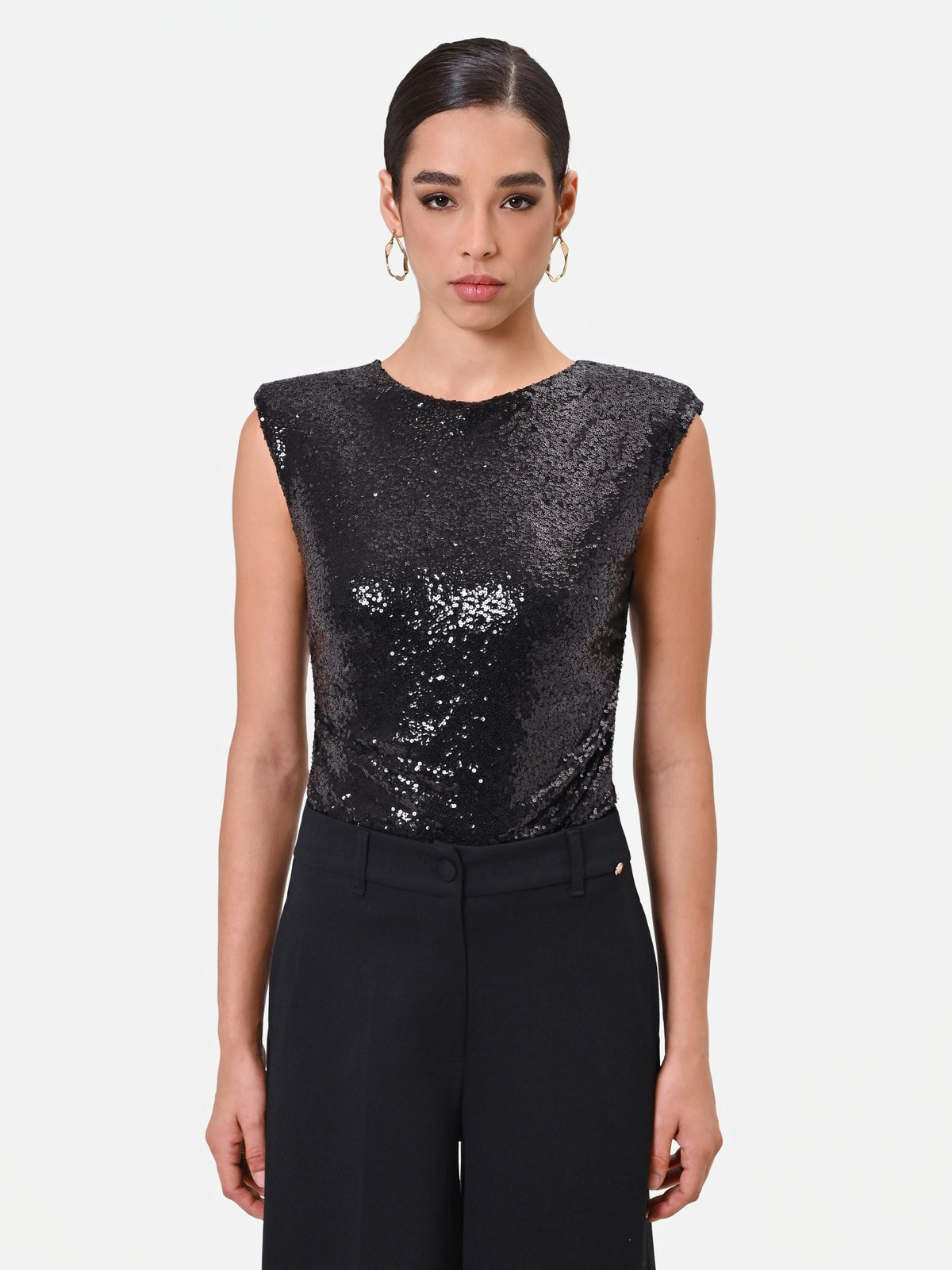 Top smanicato nero in paillettes