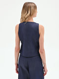 Gilet blu in jeans con bottoni dorati