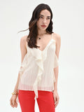 Top bianco con rouches asimmetriche