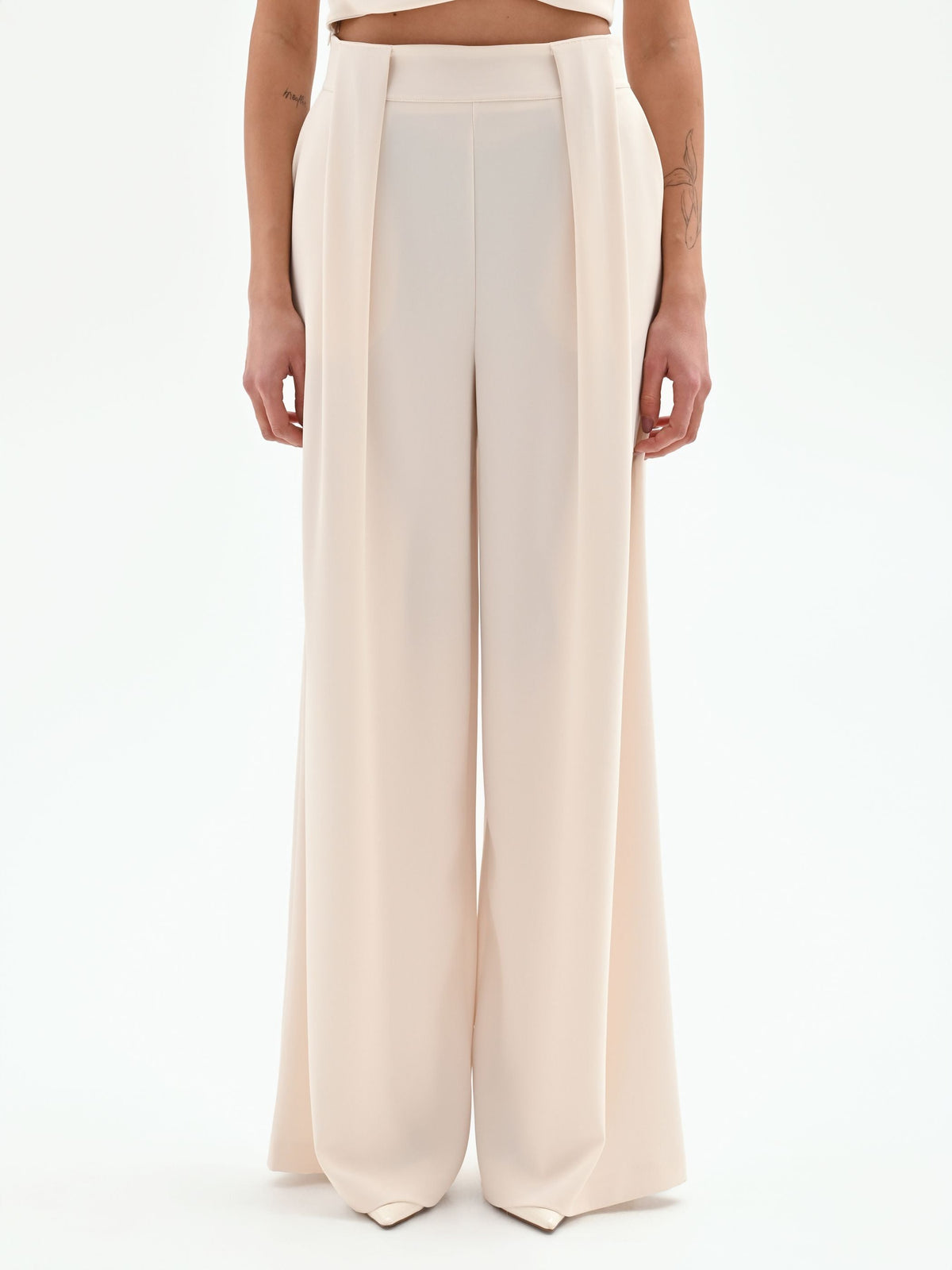 Pantalone a palazzo panna bianco con pieghe