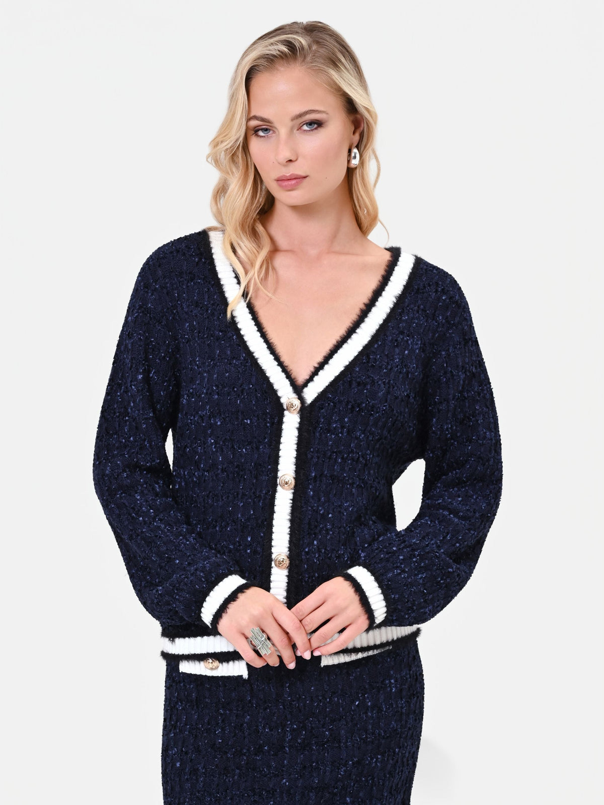 Cardigan in maglia blu navy con profili a contrasto