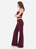 Pantalone a palazzo bordeaux rosso con piega stirata in tessuto tecnico