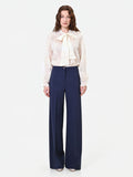 Pantalone a palazzo blu navy con piega stirata