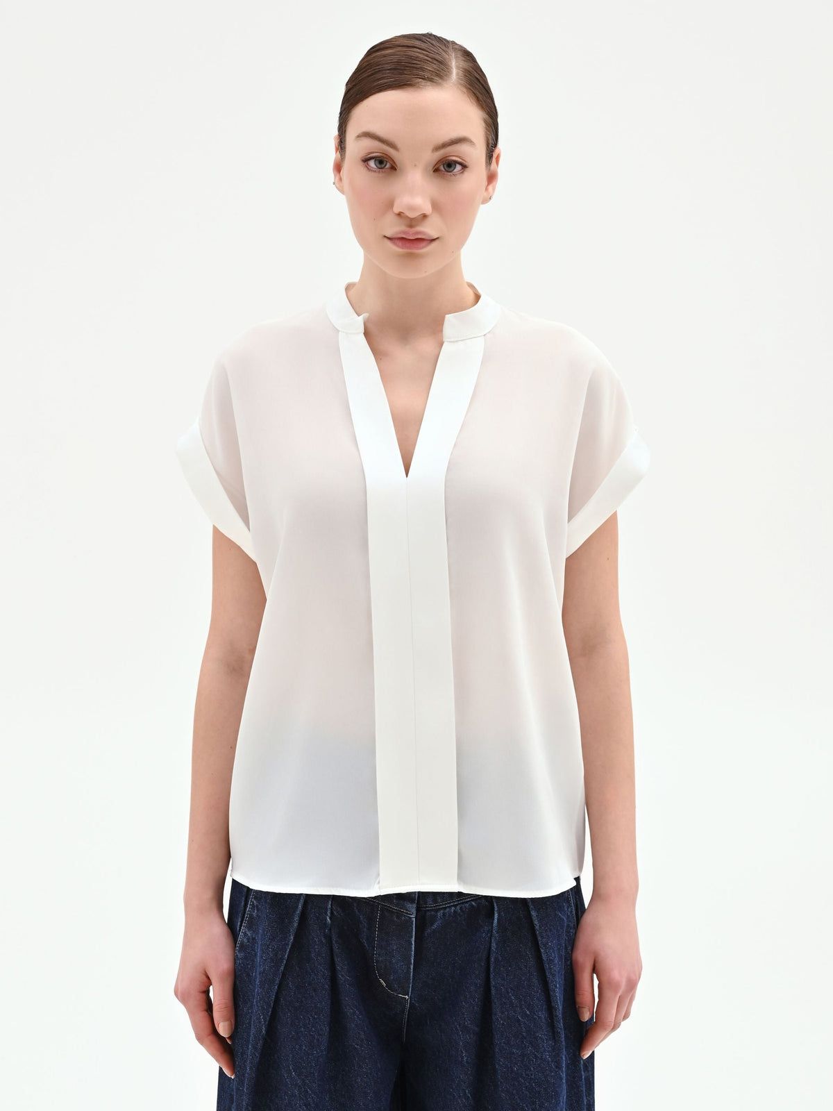 Blusa panna bianco in georgette con collo alla coreana