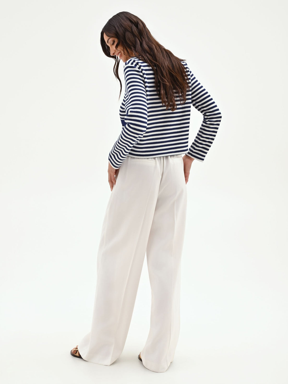 Pantalone a palazzo panna bianco con piega centrale