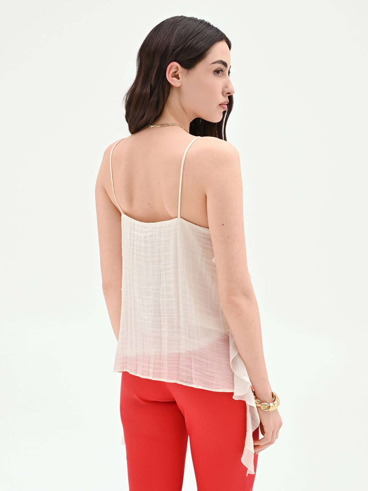 Top bianco con rouches asimmetriche