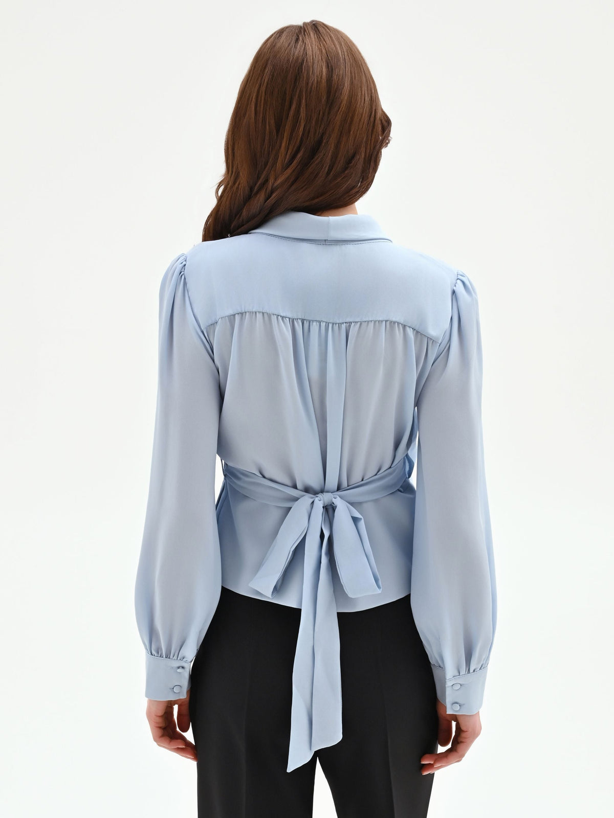 Blusa cielo azzurro con incrocio a portafoglio