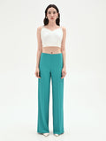 Pantalone palazzo turchese azzurro dalla linea fluida