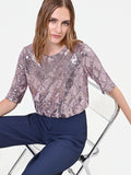 Blusa rosa antico in paillettes con disegno a rombi