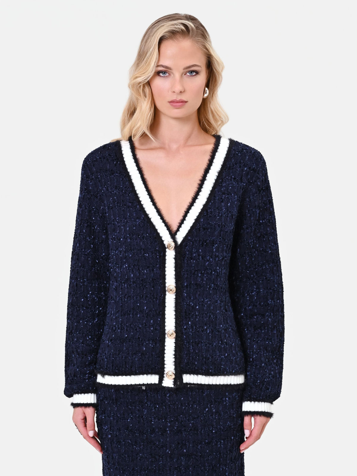 Cardigan in maglia blu navy con profili a contrasto