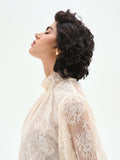 Blusa in pizzo panna bianco con collo alto