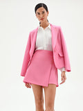 Gonna corta rosa con applicazioni metalliche