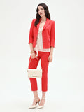 Pantalone rosso fragola con bottoni sul fondo
