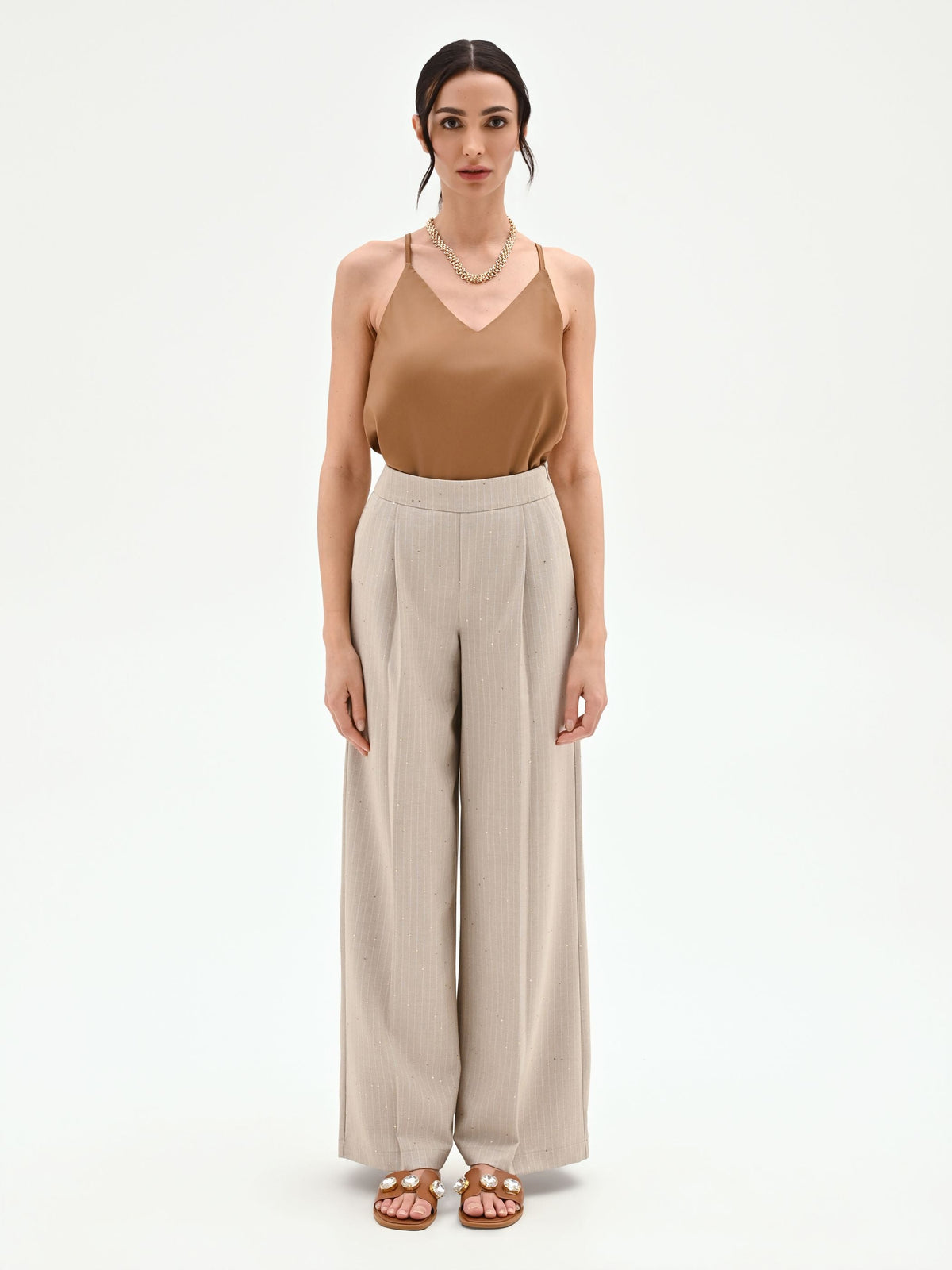 Pantalone palazzo beige gessato con punti luce
