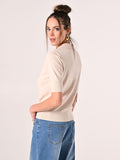 Polo in maglia beige chiaro