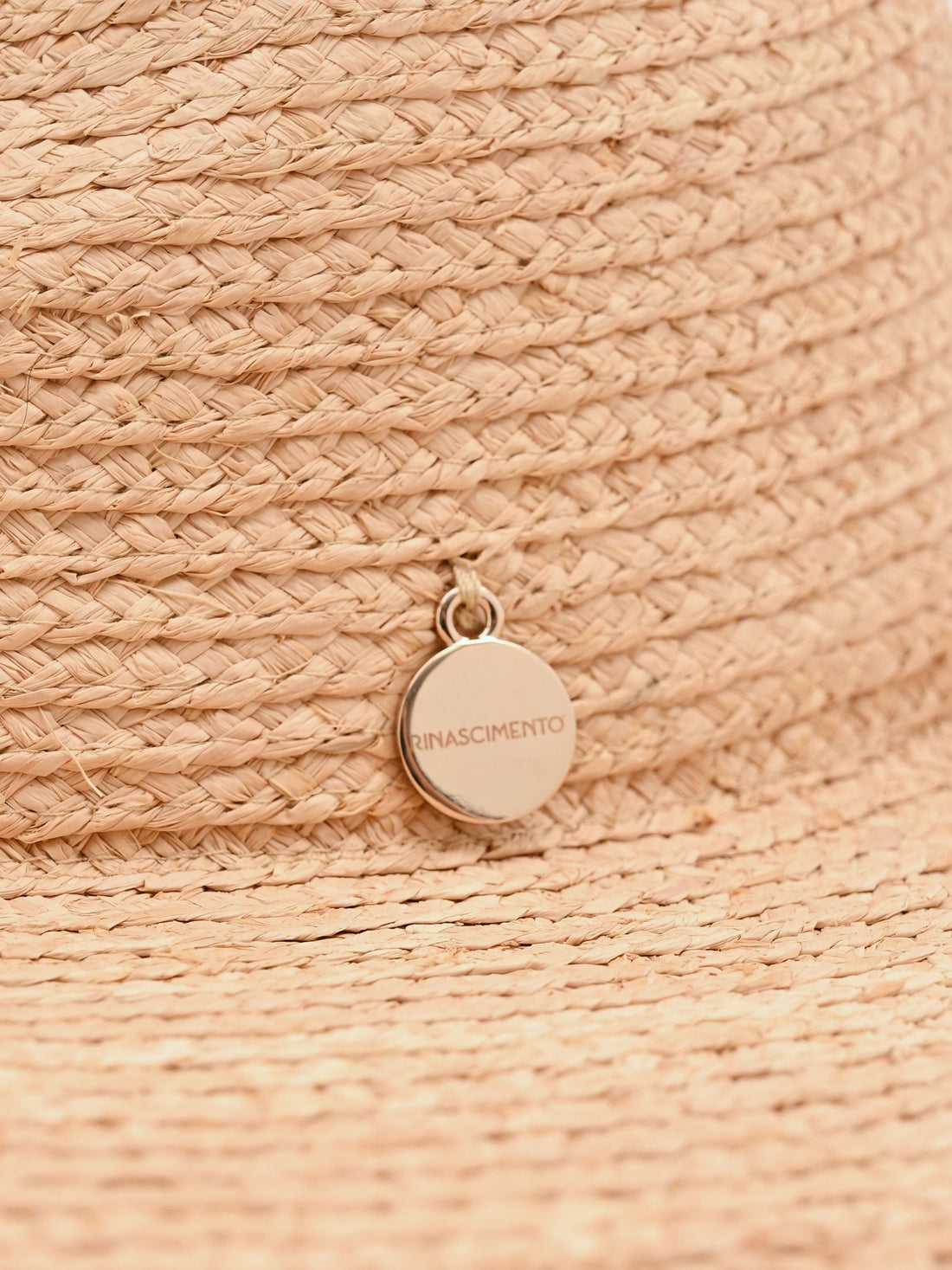 Cappello beige a tesa larga con lavorazione traforata