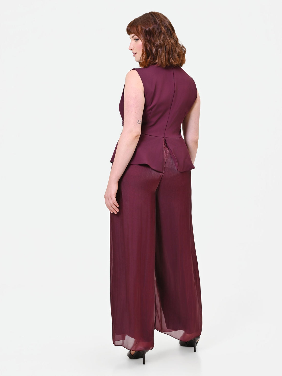 Tuta Curvy bimateriale drappeggiata bordeaux rosso