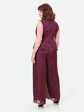 Tuta Curvy bimateriale drappeggiata bordeaux rosso