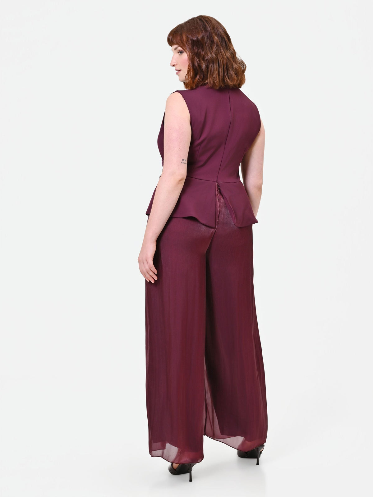 Tuta Curvy bimateriale drappeggiata bordeaux rosso