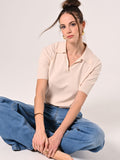 Polo in maglia beige chiaro