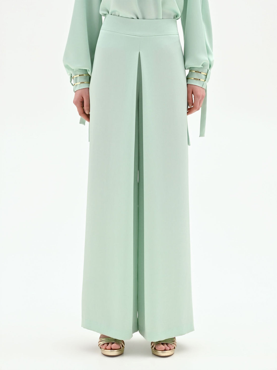 Pantalone palazzo verde menta con spacco frontale