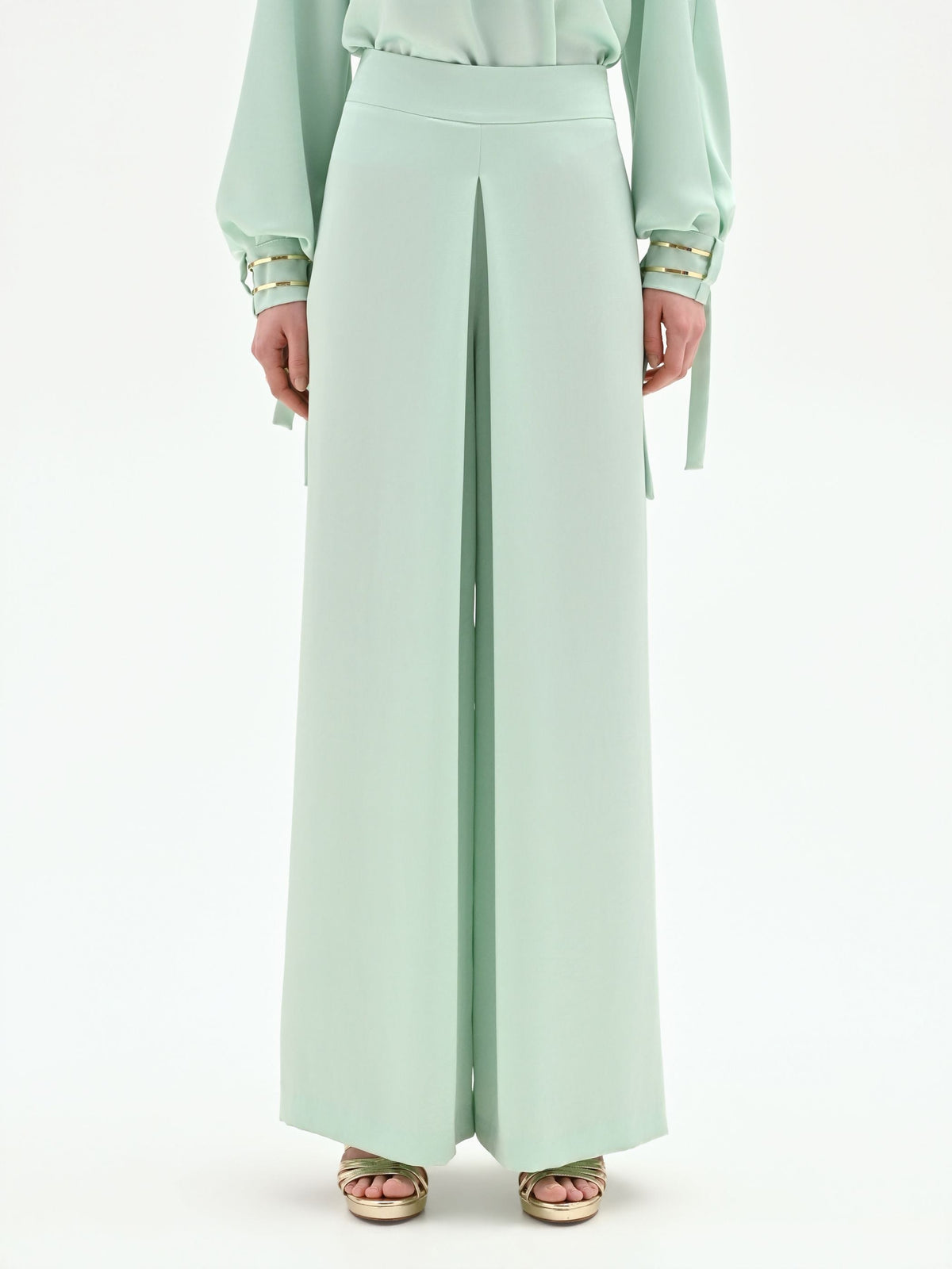 Pantalone palazzo verde menta con spacco frontale