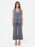 Gilet grigio con pieghe incrociate