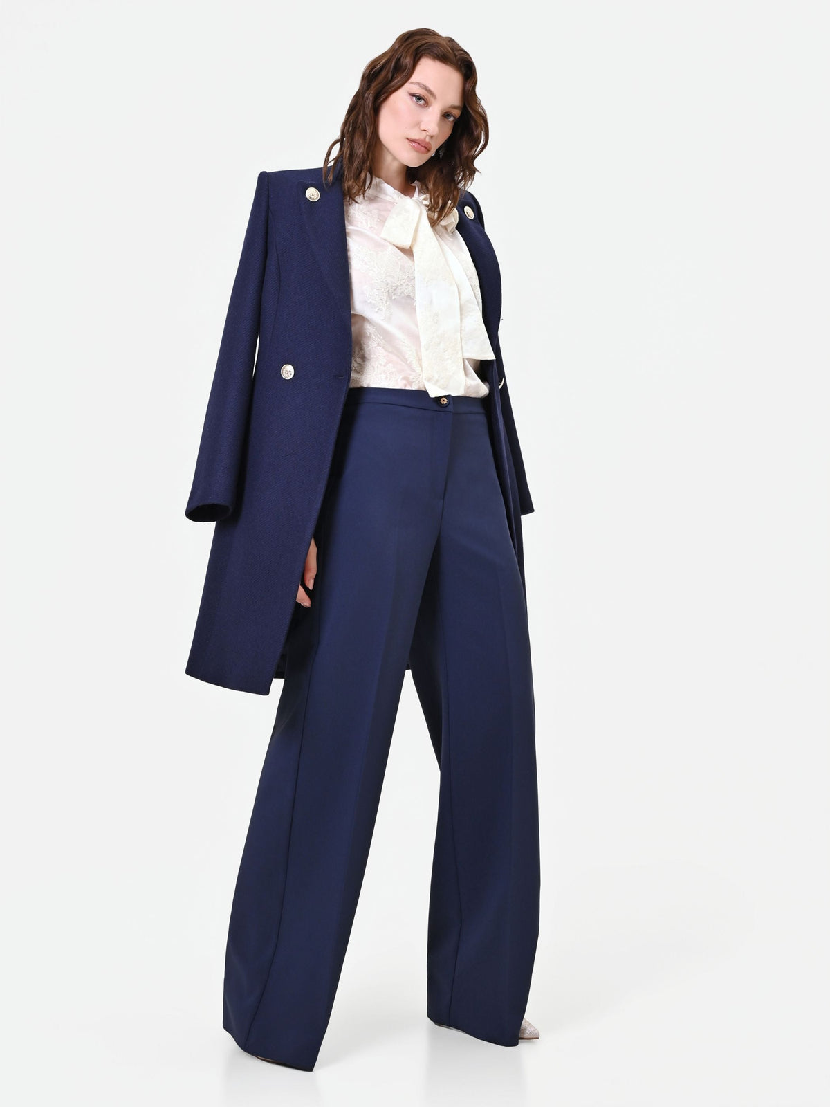 Pantalone a palazzo blu navy con piega stirata