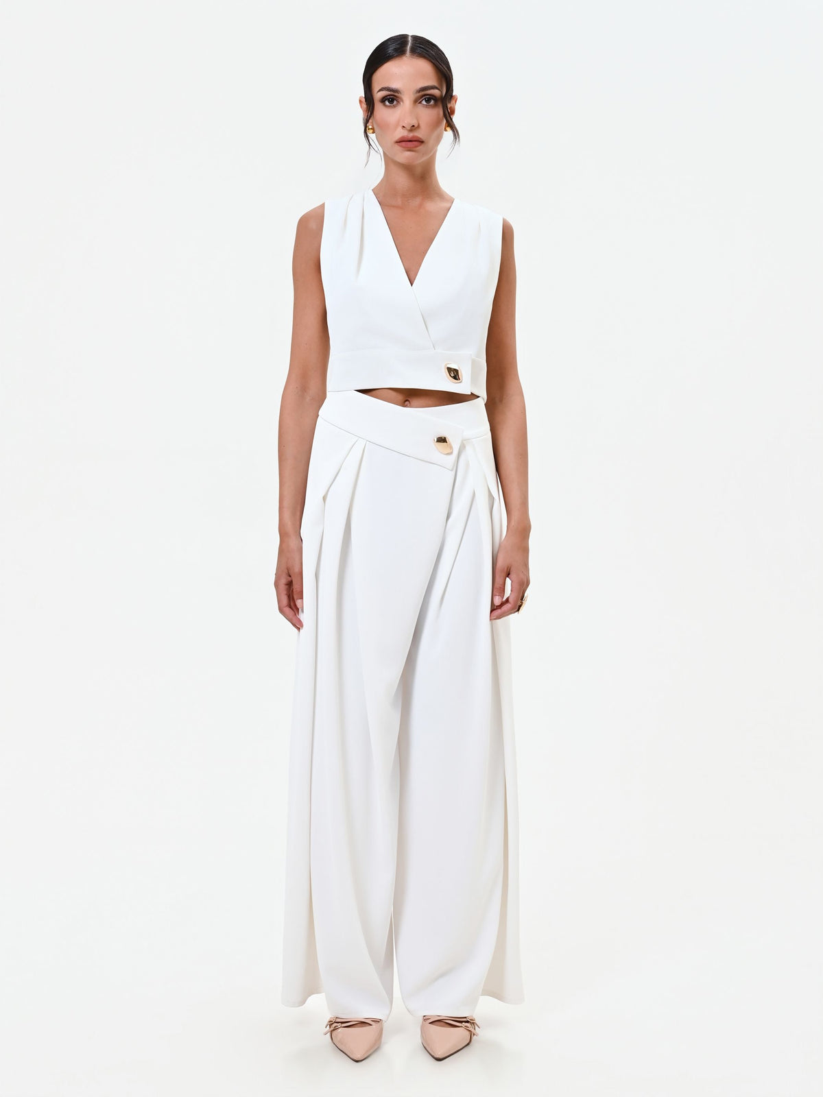 Pantalone palazzo bianco con bottone design