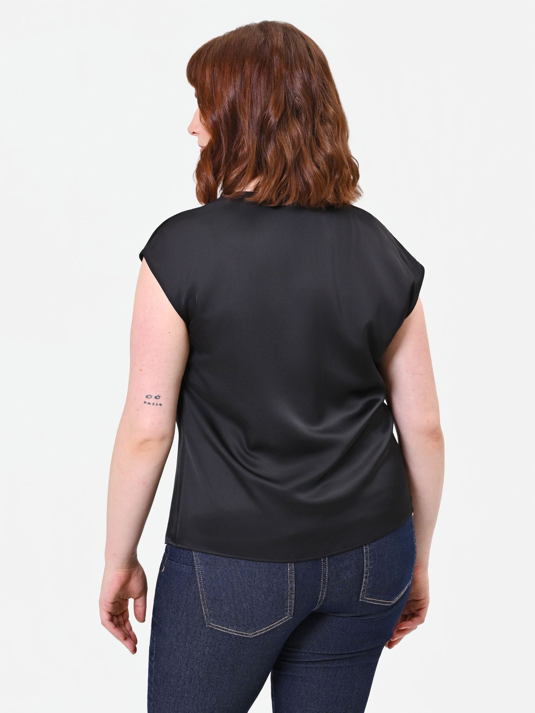 Top Curvy nero in raso con nodo centrale