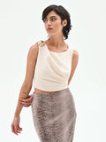 Top asimmetrico panna con accessorio oro