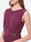 Tuta elegante bordeaux con drappeggio asimmetrico