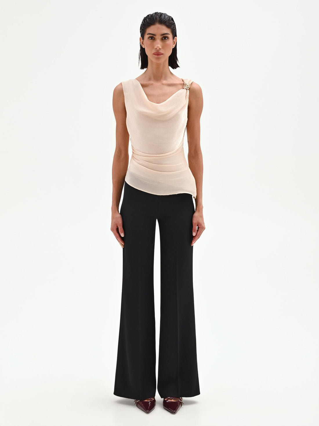 Top beige chiaro drappeggiato in tessuto cangiante
