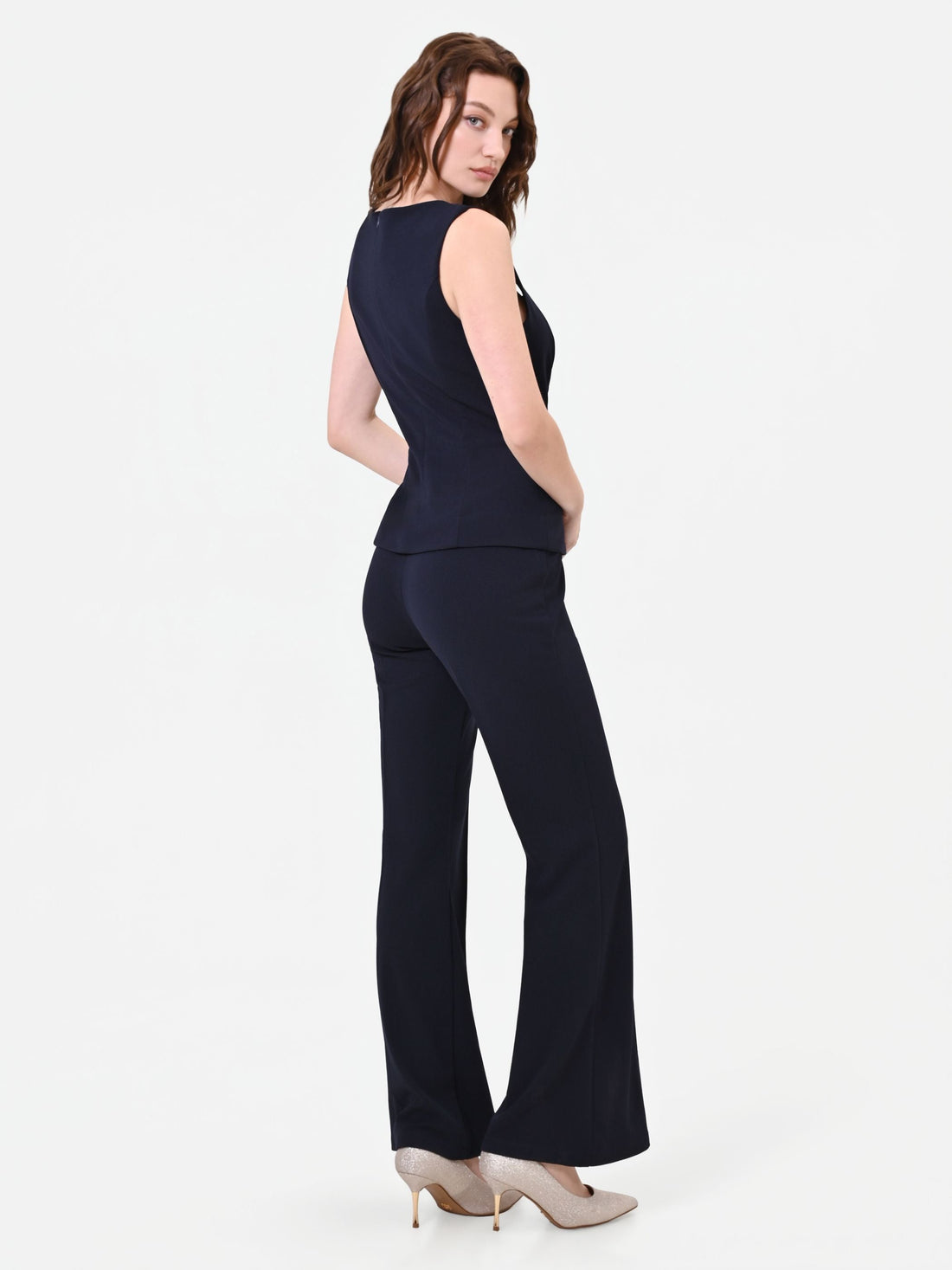 Tuta blu navy con pantalone a zampa